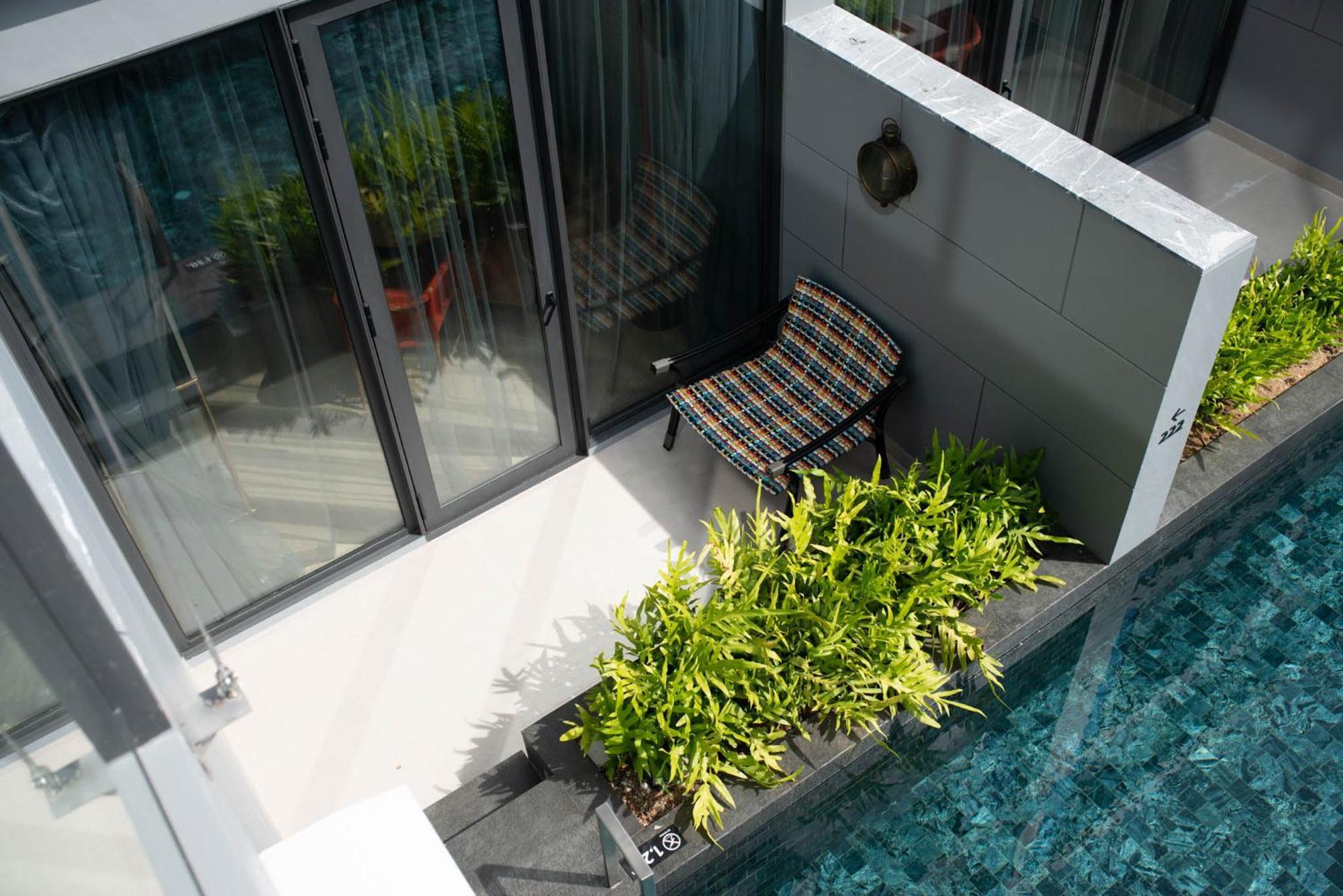 Hotel Indigo Phuket Patong By Ihg Екстер'єр фото A private pool at a landed property in Singapore